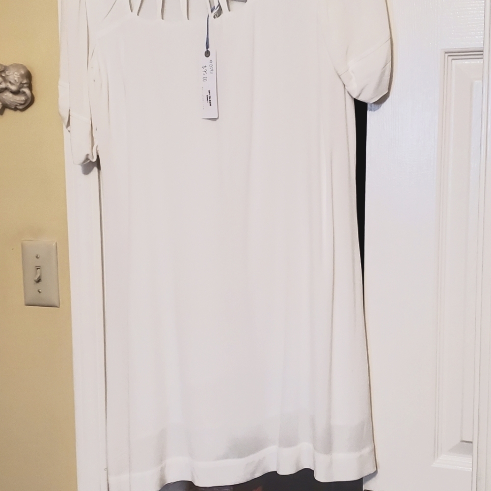 A white dress with a slip in it.